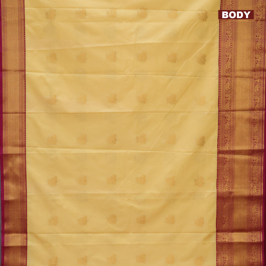 Semi kanjivaram silk saree pale yellow and magenta pink with zari woven buttas and long zari woven korvai border