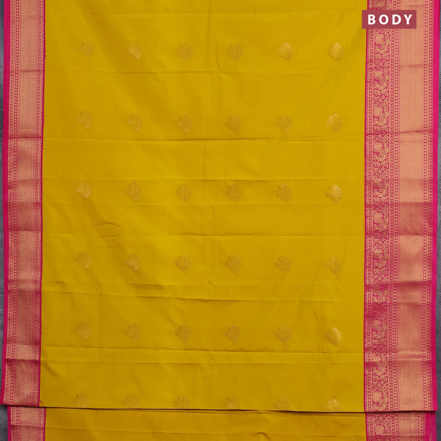 Semi kanjivaram silk saree mustard yellow and pink with zari woven buttas and long zari woven korvai border