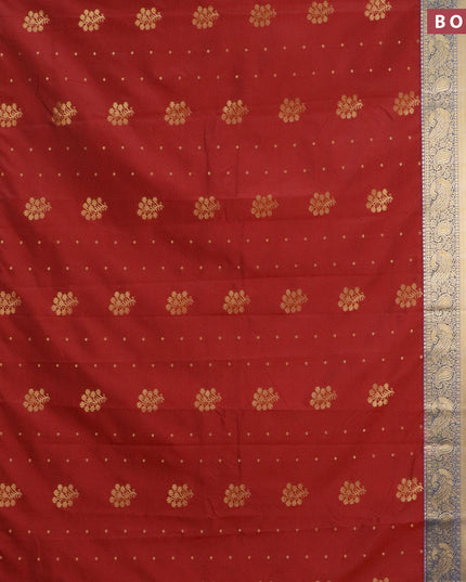 Semi kanjivaram silk saree maroon and cs blue with zari woven floral buttas and long zari woven korvai border