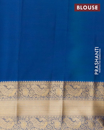 Semi kanjivaram silk saree maroon and cs blue with zari woven floral buttas and long zari woven korvai border