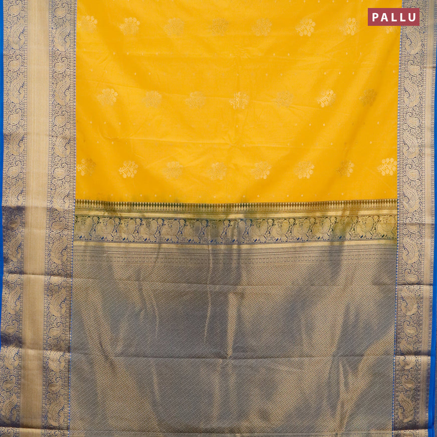 Semi kanjivaram silk saree mango yellow and cs blue with zari woven floral buttas and long zari woven korvai border