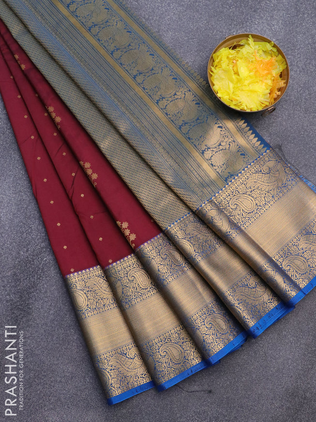 Semi kanjivaram silk saree deep maroon and cs blue with zari woven floral buttas and long zari woven korvai border