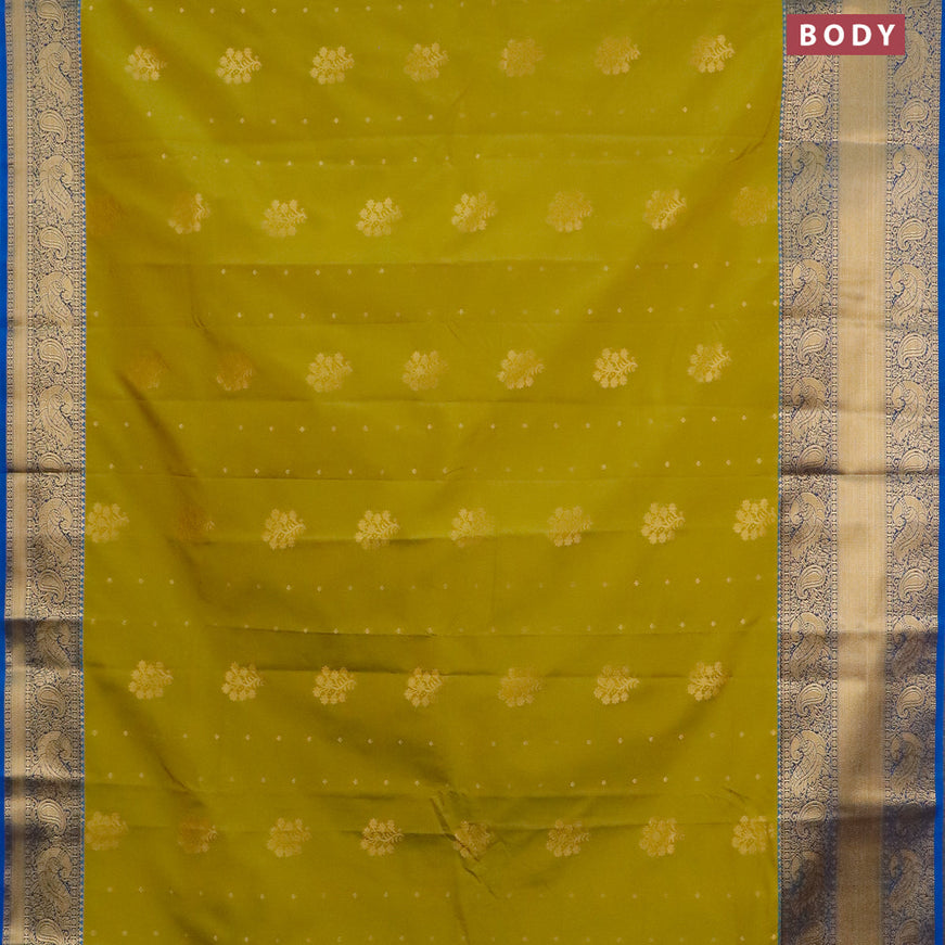 Semi kanjivaram silk saree mehendi green and cs blue with zari woven floral buttas and long zari woven korvai border