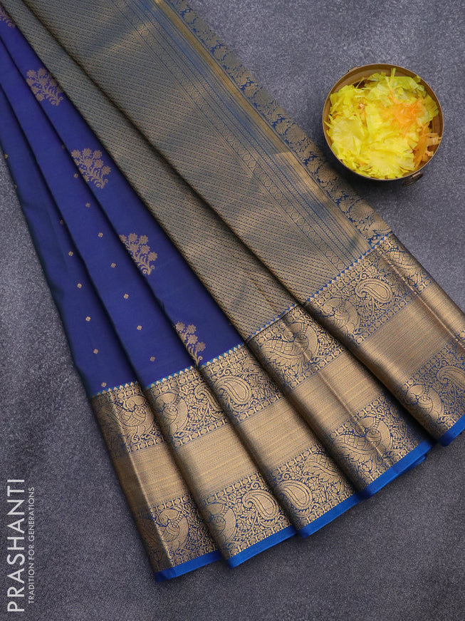 Semi kanjivaram silk saree blue and cs blue with zari woven floral buttas and long zari woven korvai border