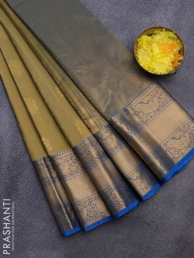 Semi kanjivaram silk saree elaichi green and cs blue with zari woven floral buttas and long zari woven korvai border
