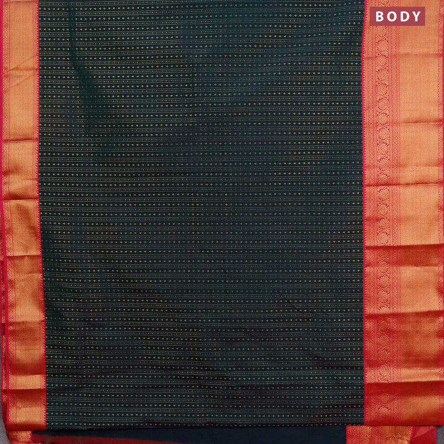 Semi kanjivaram silk saree dual shade of dark green and pink with allover zari weaves and long zari woven korvai border