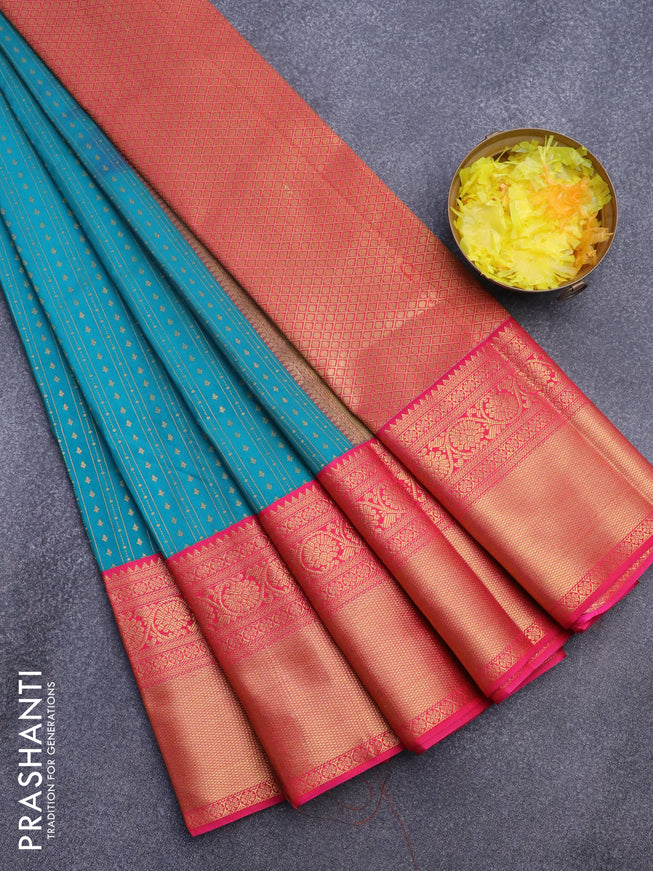 Semi kanjivaram silk saree teal blue and pink with allover zari weaves and long zari woven korvai border