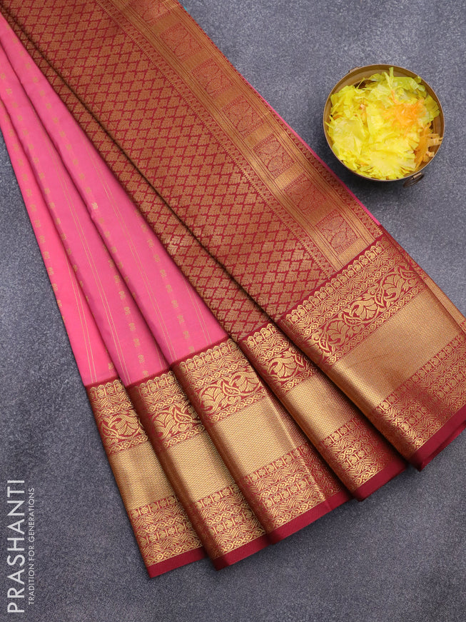 Semi kanjivaram silk saree peach pink and maroon with allover zari weaves and long zari woven korvai border