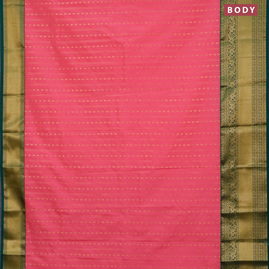 Semi kanjivaram silk saree light pink and dark green with allover zari weaves and long zari woven korvai border