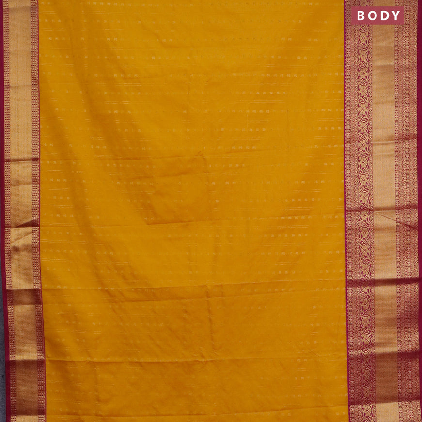 Semi kanjivaram silk saree mustard yellow and magenta pink with allover zari weaves and long zari woven korvai border