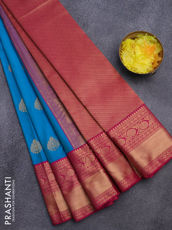 Semi kanjivaram silk saree dual shade of blue and magenta pink with zari woven buttas and long zari woven korvai border