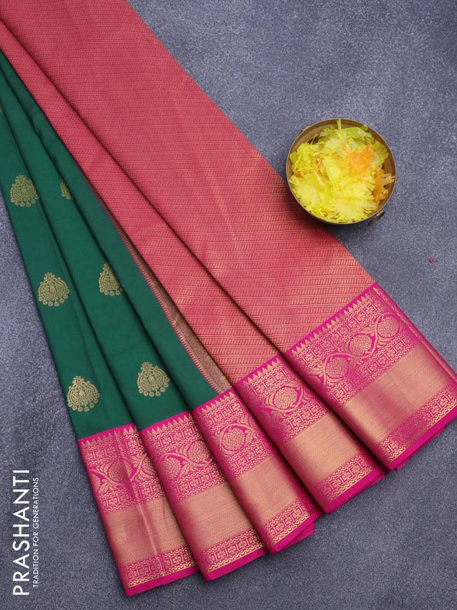 Semi kanjivaram silk saree dark green and pink with zari woven buttas and long zari woven korvai border