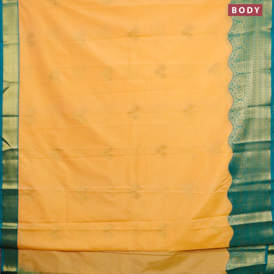 Semi kanjivaram silk saree pale orange and teal blue with zari woven buttas and rich zari woven korvai border