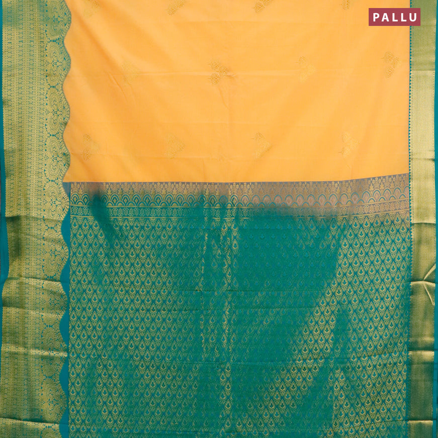 Semi kanjivaram silk saree pale orange and teal blue with zari woven buttas and rich zari woven korvai border