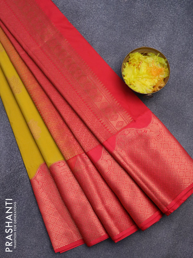 Semi kanjivaram silk saree yellow and pink shade with copper zari woven buttas and rich copper zari woven korvai border