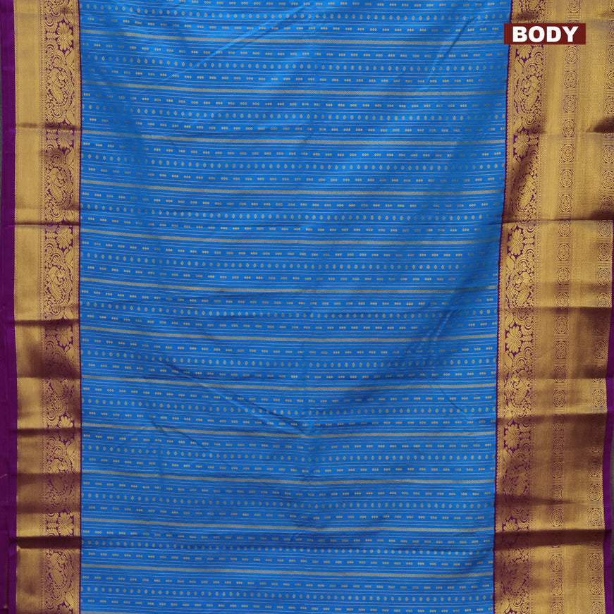 Semi kanjivaram silk saree cs blue and deep purple with allover zari weaves & buttas and zari woven korvai border