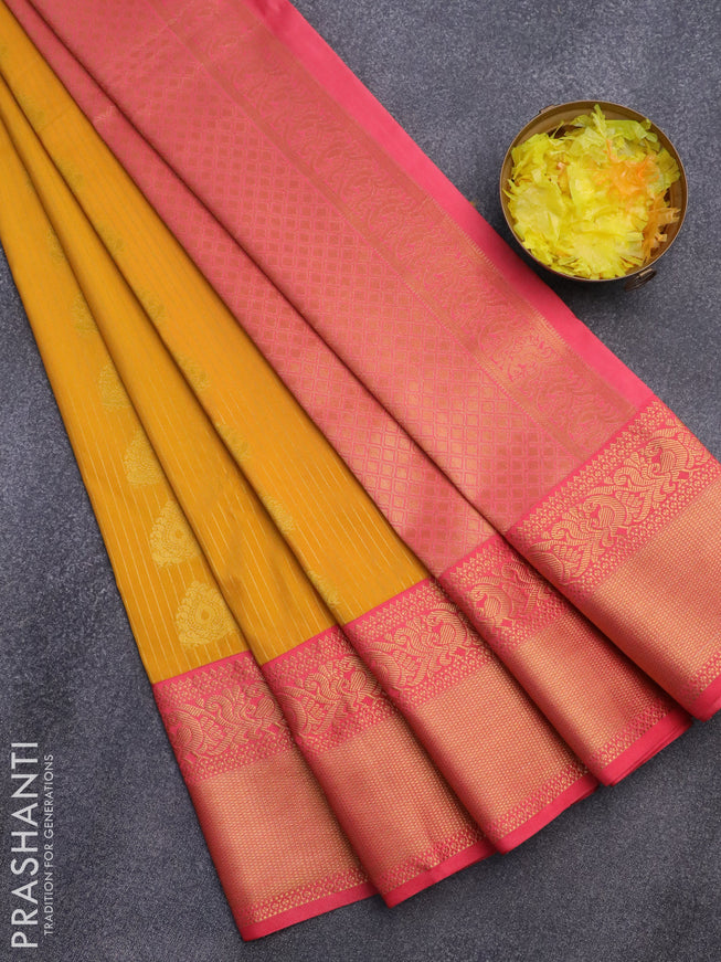 Semi kanjivaram silk saree mango yellow and peach pink with allover zari weaves and zari woven korvai border