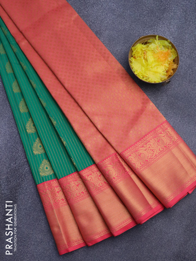 Semi kanjivaram silk saree green and peach pink with allover zari weaves and zari woven korvai border
