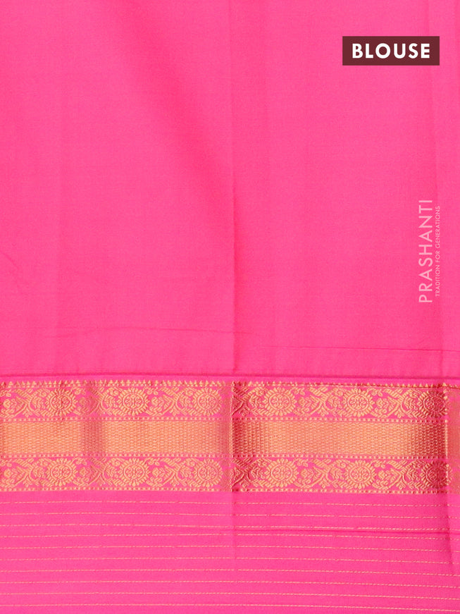 Semi kanjivaram silk saree teal green shade and pink with zari woven buttas and long zari woven korvai border
