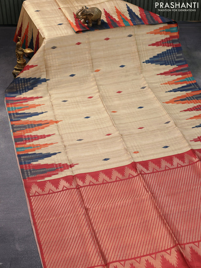Semi tussar saree sandal and maroon sjade with allover zari weaves and temple design border