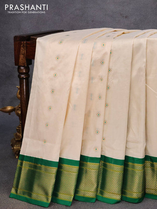 Pure paithani silk saree off white and green with allover zari woven floral buttas and zari woven border