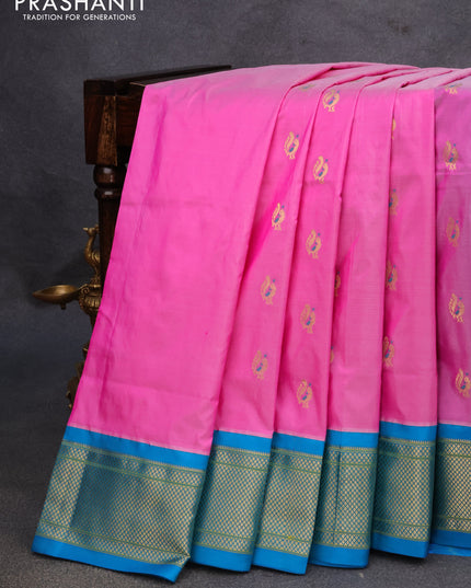 Pure paithani silk saree light pink and cs blue with peacock zari woven buttas and zari woven border