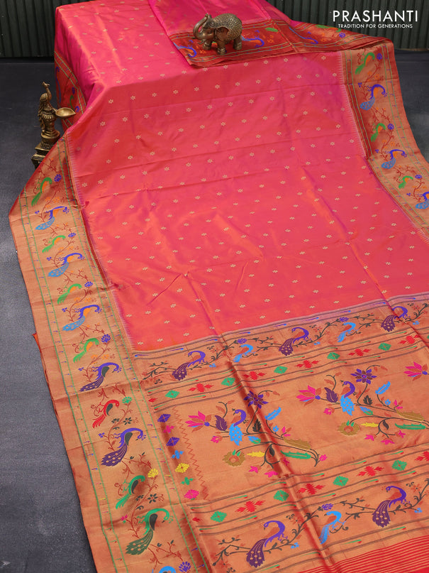 Pure paithani silk saree dual shade of pinkish orange and red with allover zari woven floral buttas and zari woven peacock design paithani border