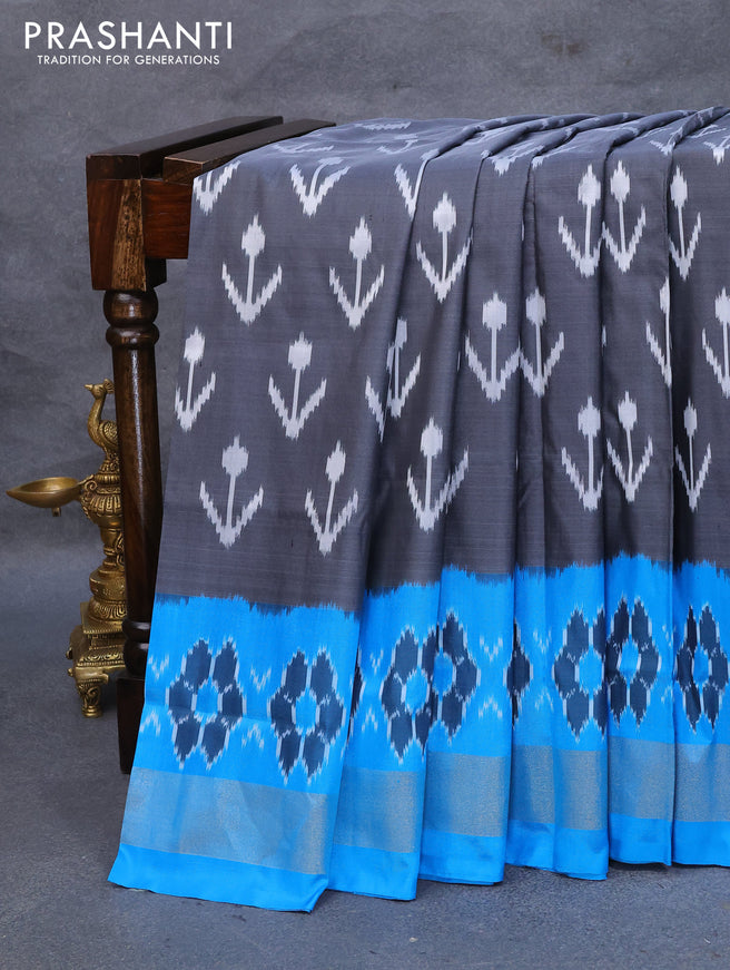 Pochampally silk saree elephant grey and cs blue with allover ikat weaves and ikat design zari woven border