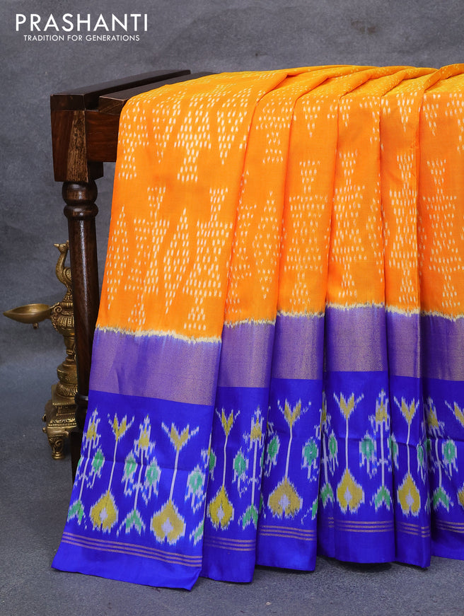 Pochampally silk saree orange and blue with allover ikat weaves and long zari woven ikat style border