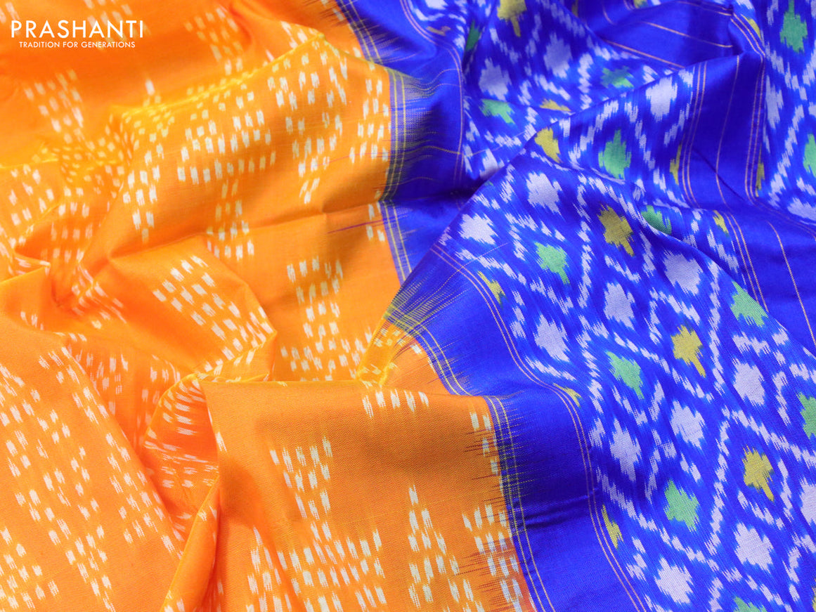 Pochampally silk saree orange and blue with allover ikat weaves and long zari woven ikat style border