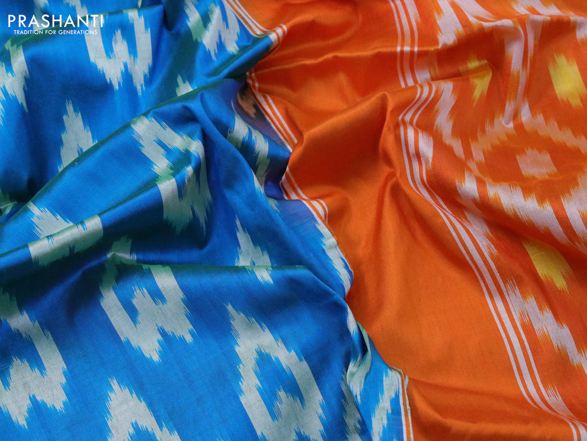 Pochampally silk saree dual shade of cs blue and orange with allover ikat woven butta weaves and zari woven ikat style border