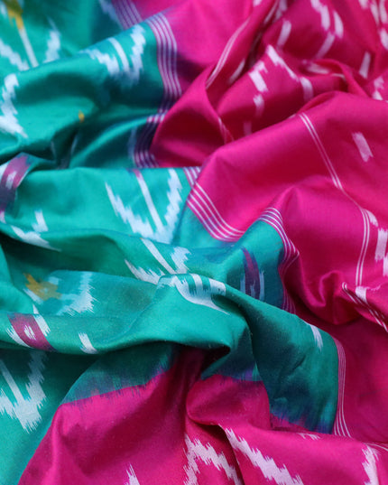Pochampally silk saree teal green and pink with allover ikat woven butta weaves and ikat design zari woven border