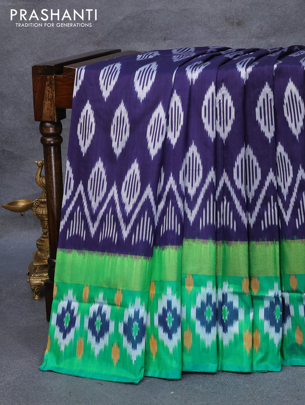 Pochampally silk saree dark blue and green with allover ikat woven butta weaves and zari woven ikat style border