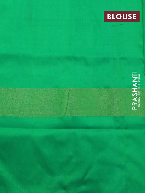 Pochampally silk saree dark blue and green with allover ikat woven butta weaves and zari woven ikat style border