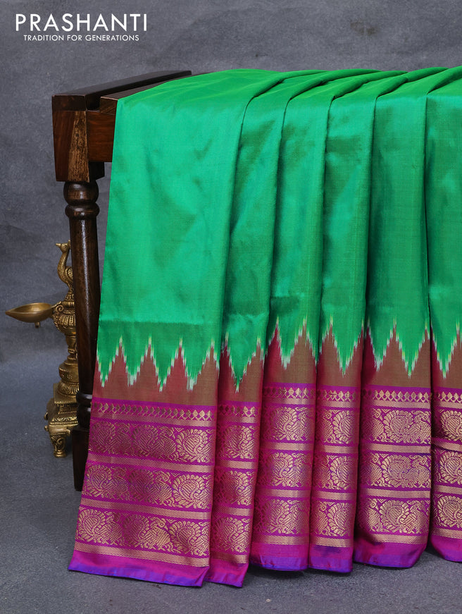 Pochampally silk saree green and purple with plain body and annam design zari woven border