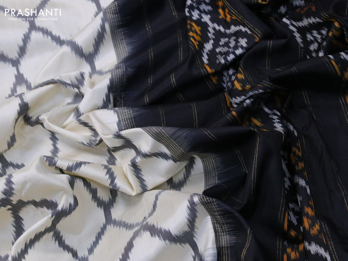 Pochampally silk saree cream and black with allover ikat weaves and zari woven border