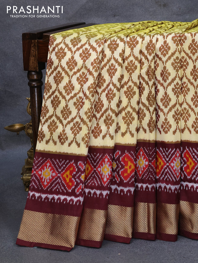 Pochampally silk saree pale yellow and deep maroon with allover ikat weaves and ikat design zari woven border