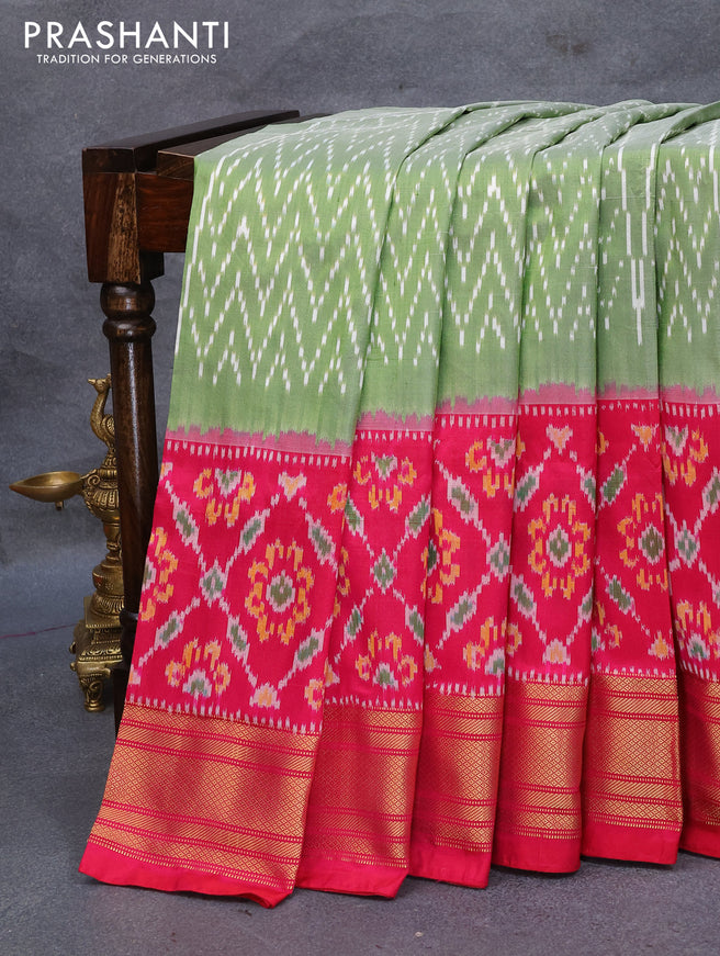Pochampally silk saree green shade and pink with allover ikat weaves and ikat design zari woven border