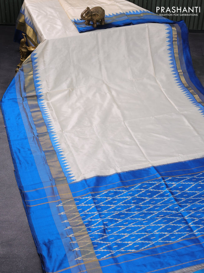 Pochampally silk saree cream and cs blue with plain body and temple design zari woven simple border