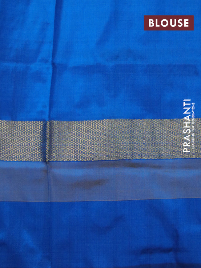 Pochampally silk saree cream and cs blue with plain body and temple design zari woven simple border