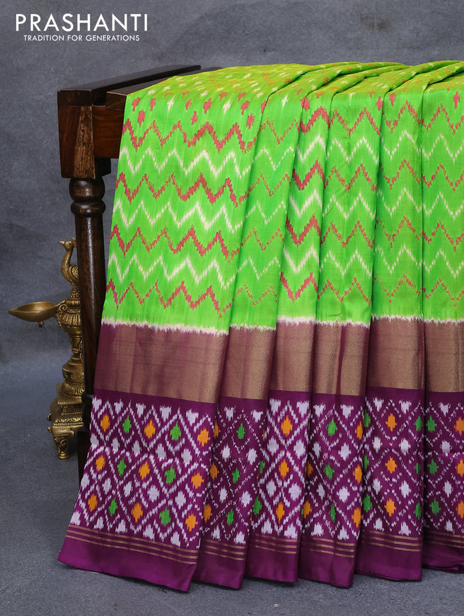 Pochampally silk saree light green and deep purple with allover ikat weaves and zari woven ikat style border