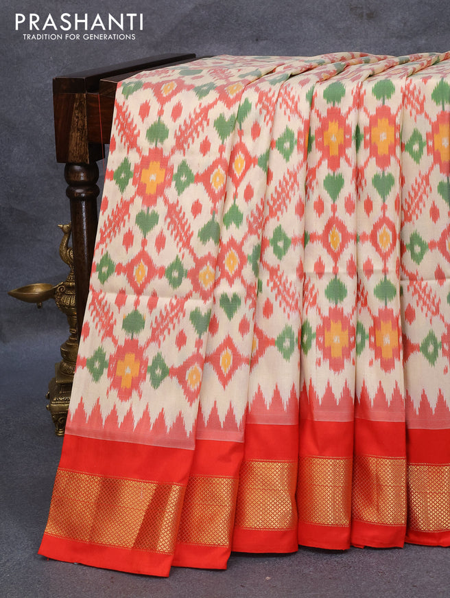 Pochampally silk saree cream and orange with allover ikat weaves and zari woven border