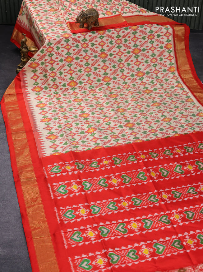 Pochampally silk saree cream and orange with allover ikat weaves and zari woven border