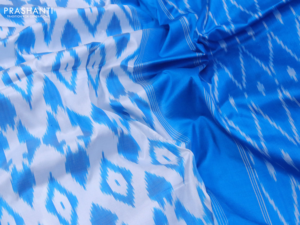 Pochampally silk saree off white and cs blue with allover ikat weaves and zari woven ikat style border