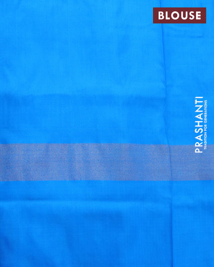 Pochampally silk saree orange and cs blue with allover ikat weaves and zari woven ikat style border
