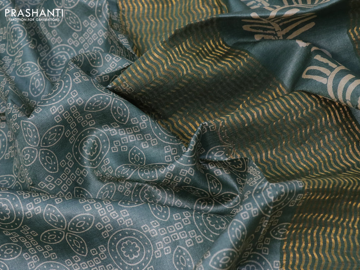 Pure tussar silk saree pastel green with allover prints and zari woven border