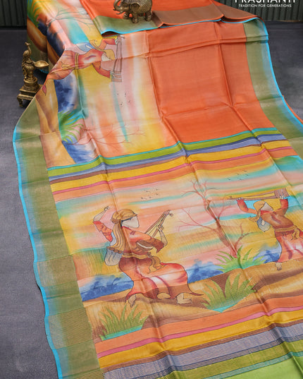Pure tussar silk saree orange and light blue with hand painted prints and zari woven border