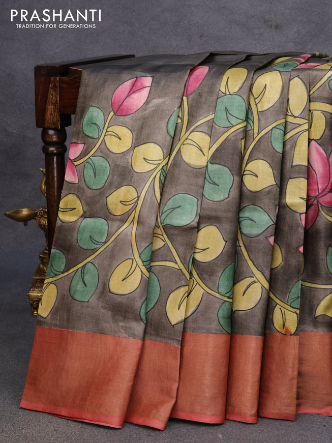 Pure tussar silk saree grey shade and rust shade with allover hand painted prints and zari woven border