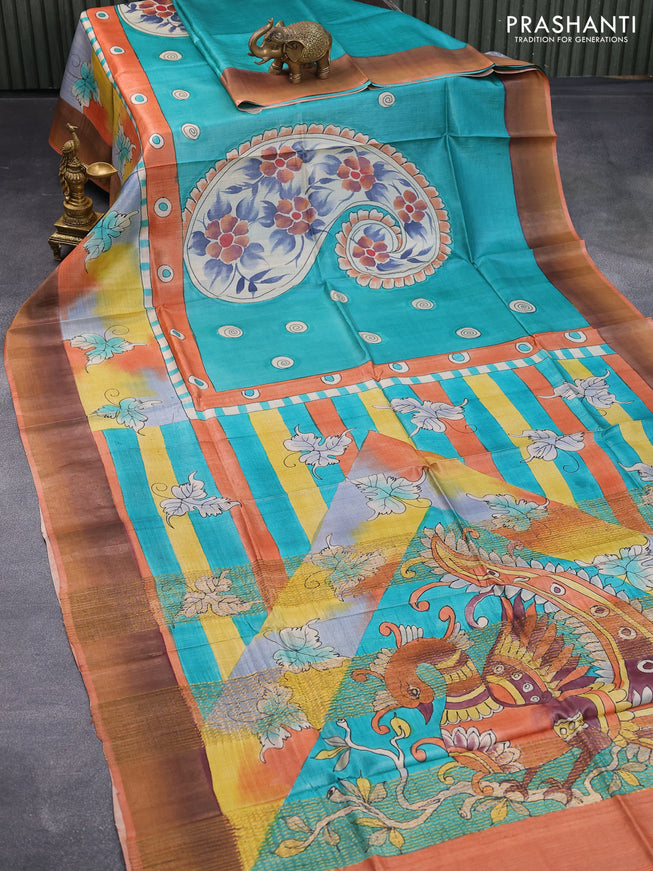 Pure tussar silk saree teal blue and pastel peach with allover kalamkari hand painted prints and zari woven border