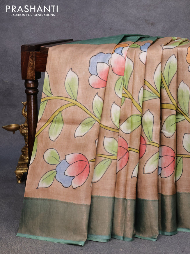 Pure tussar silk saree pastel brown and pastel shade of green with allover floral kalamkari hand painted prints and zari woven border
